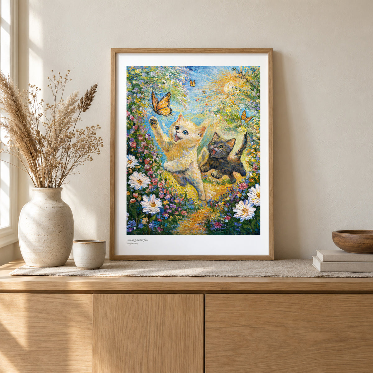 Chasing Butterflies studio print, 17 × 22 in, in a light oak frame on a sideboard (frame not included)