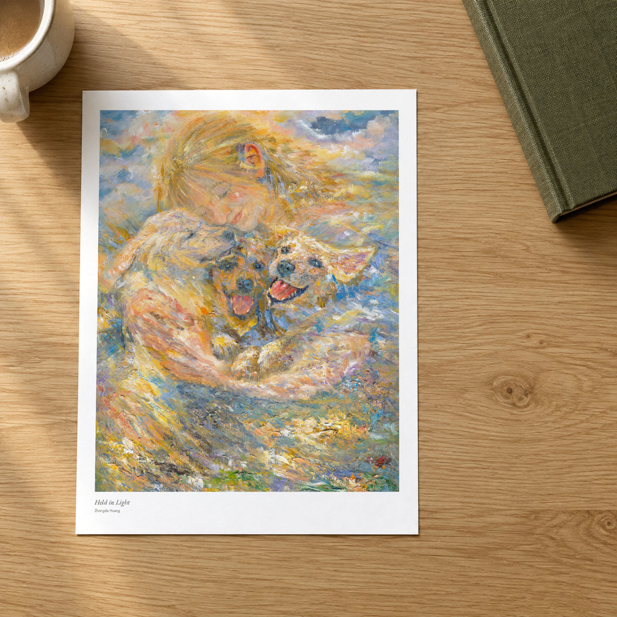 Held in Light studio print on a light oak desk