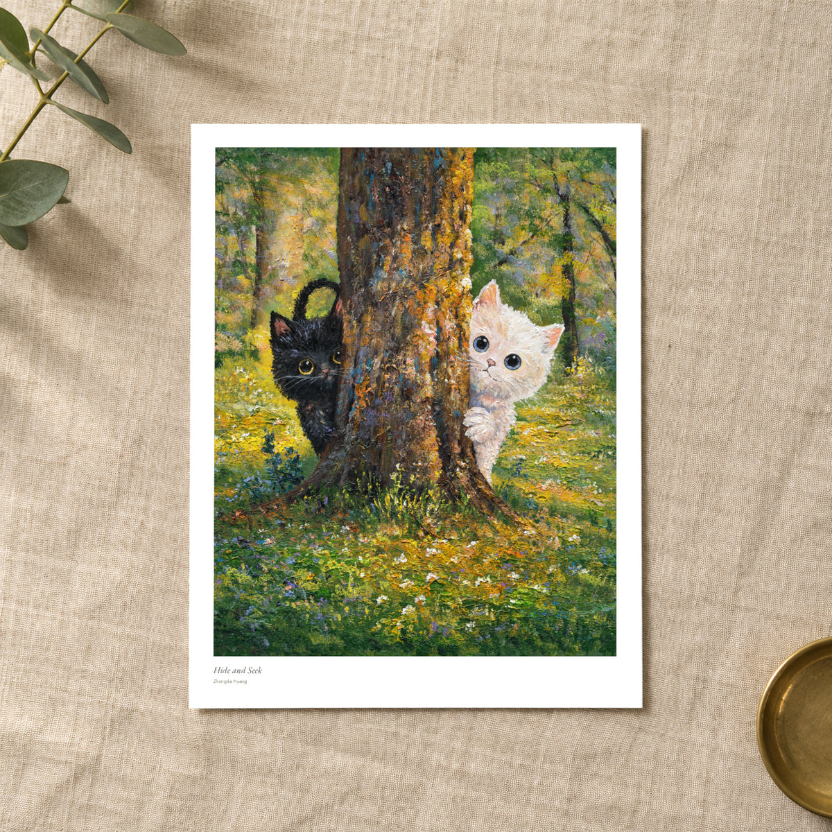 Hide and Seek studio print with title and signature margin, lying on linen