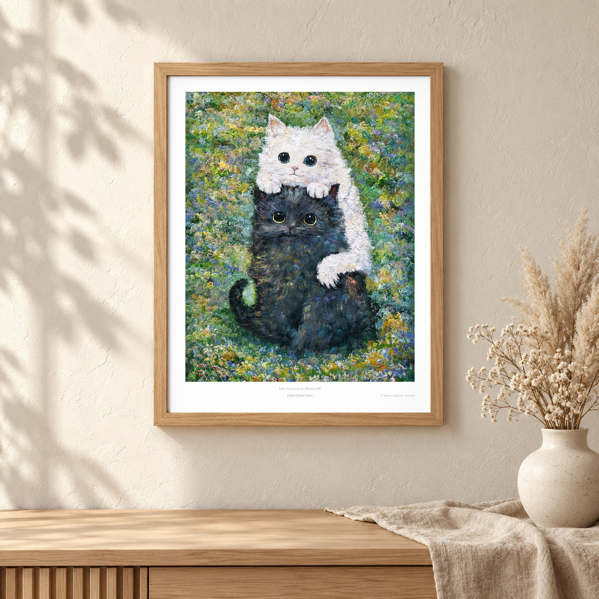 Little Hearts in the Meadow III art print shown in an oak frame on a wall (frame not included)