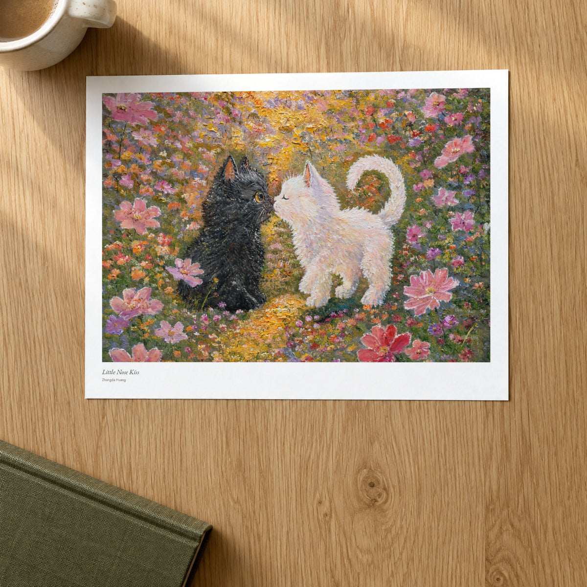 Little Nose Kiss studio print on a light oak desk