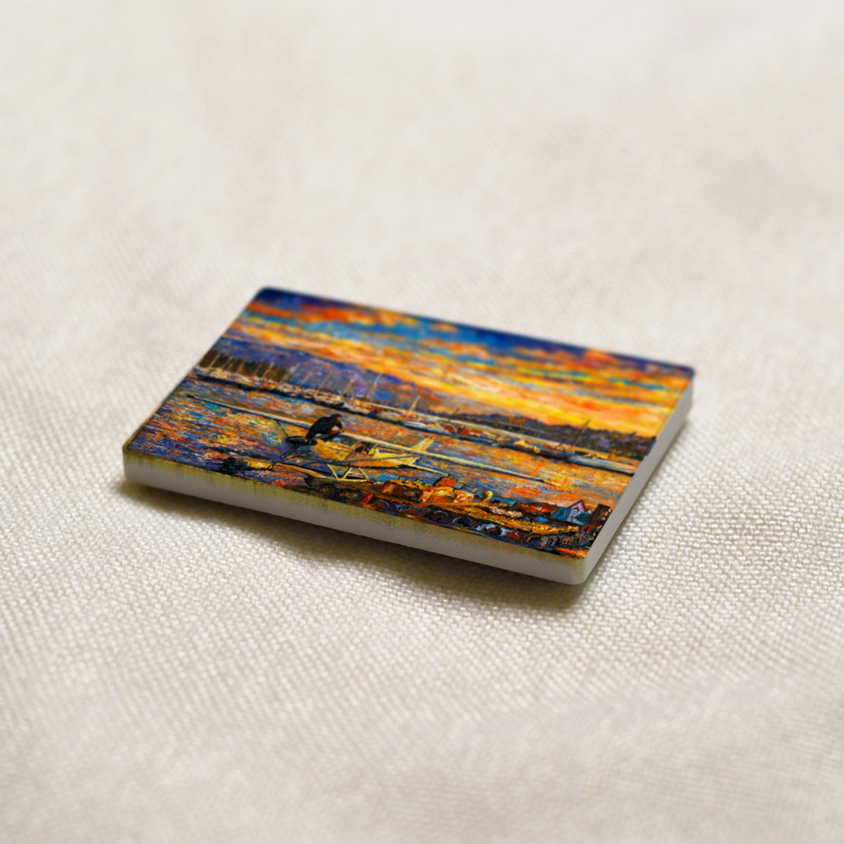 Okanagan Lake, Between Departures art magnet at an angle, showing the stone edge