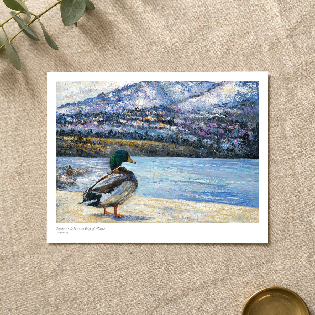Okanagan Lake at the Edge of Winter studio print with title and signature margin, lying on linen