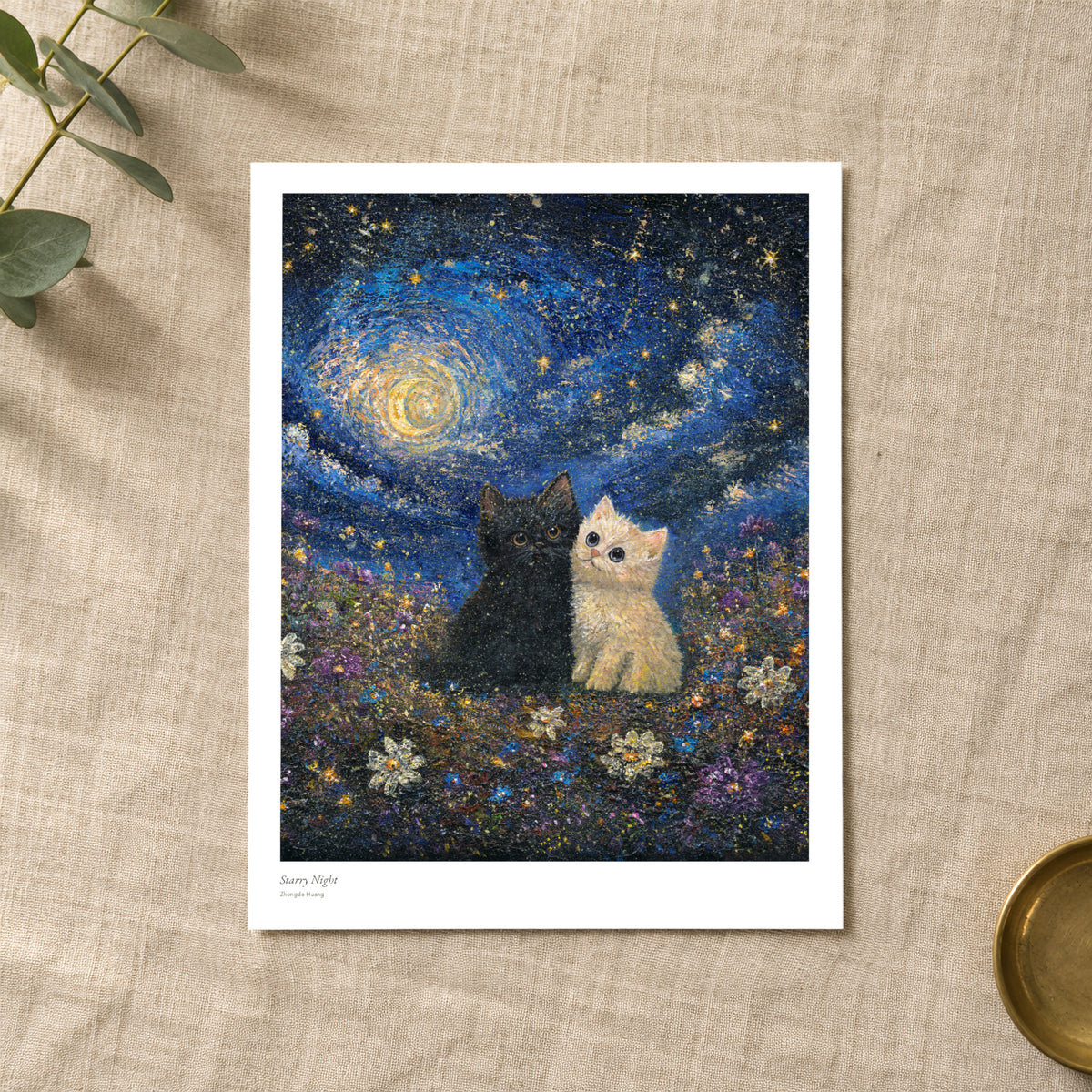 Starry Night studio print with title and signature margin, lying on linen