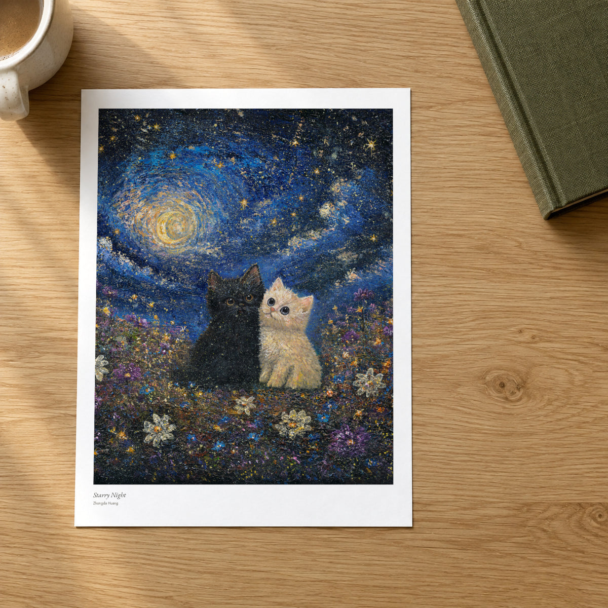 Starry Night studio print on a light oak desk
