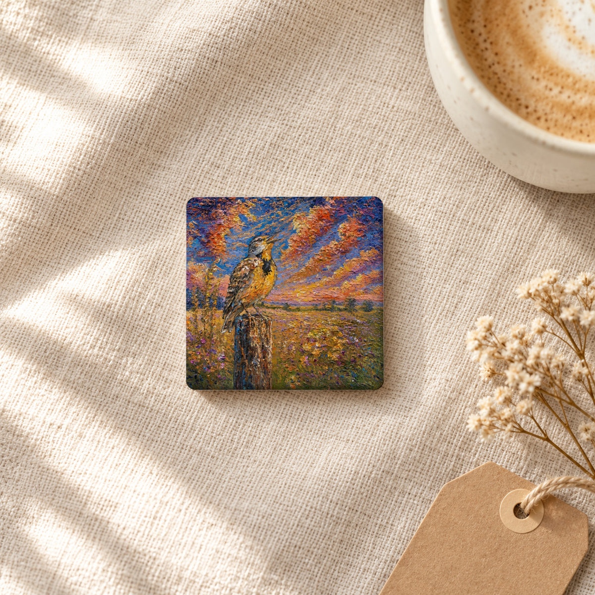 Western Meadowlark art magnet on linen with coffee and dried flowers