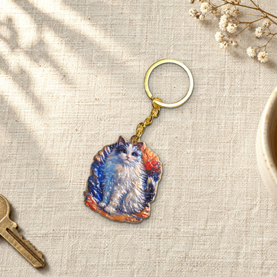 Bunbun keychain on a linen table with house keys