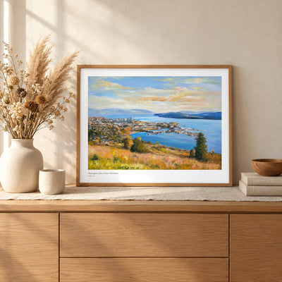 Okanagan Lake at Knox Mountain studio print, 22 × 17 in, in a light oak frame on a sideboard (frame not included)