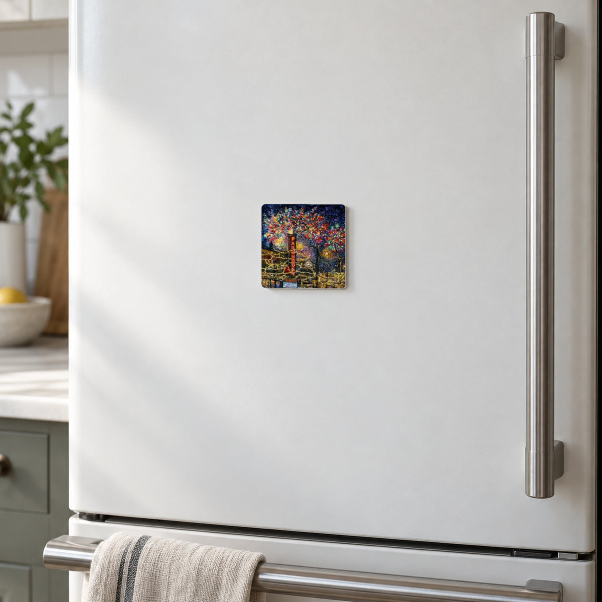 Downtown Kelowna, Fireworks art magnet on a warm white fridge door