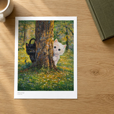 Hide and Seek studio print on a light oak desk
