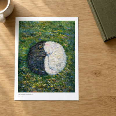 Little Hearts in the Meadow II studio print on a light oak desk