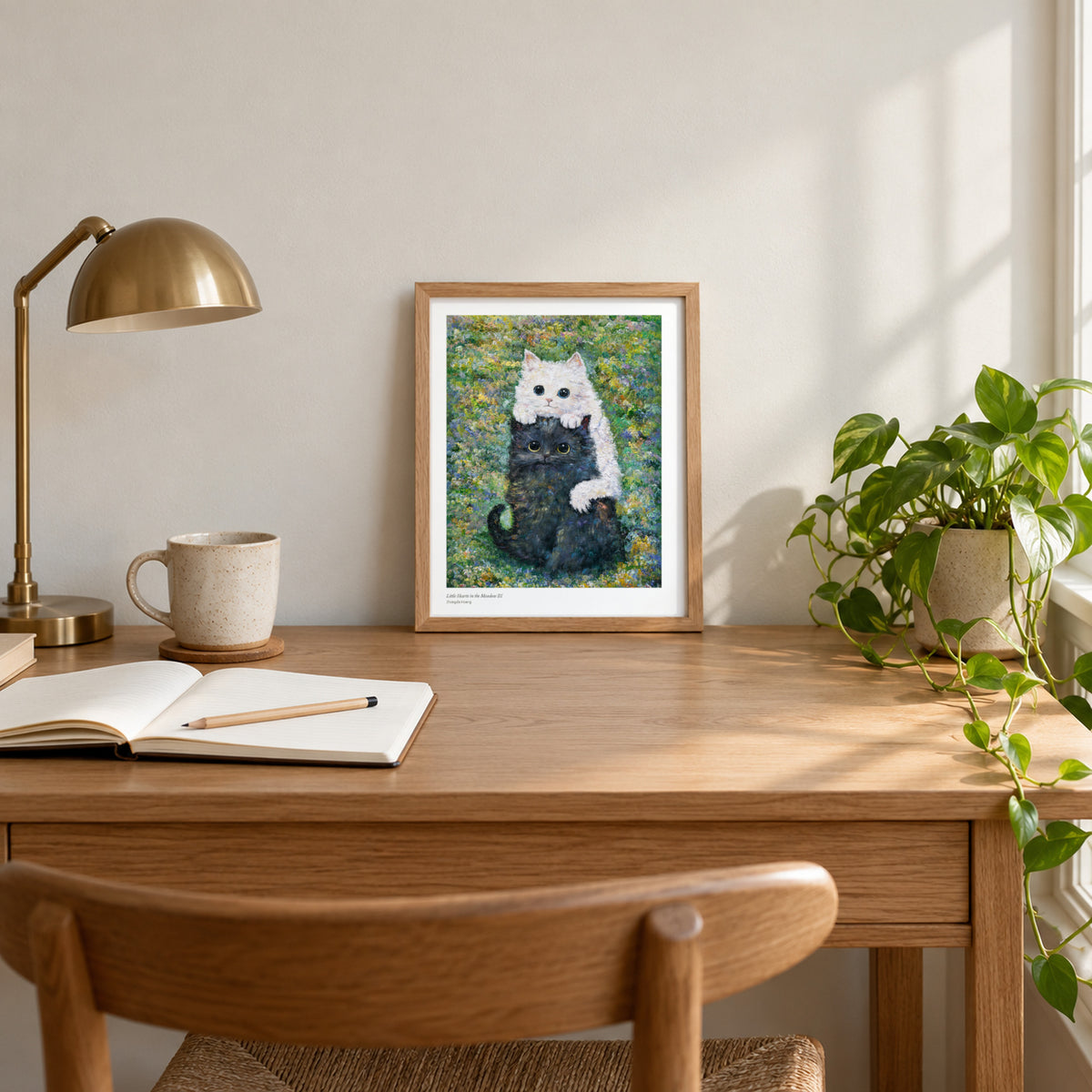 Little Hearts in the Meadow III studio print, 8.5 × 11 in, in a light oak frame on a desk (frame not included)
