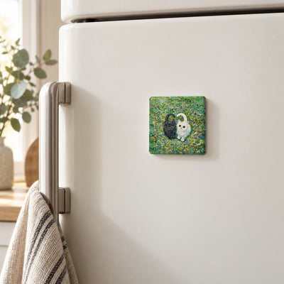 Little Hearts in the Meadow art magnet on a white fridge door