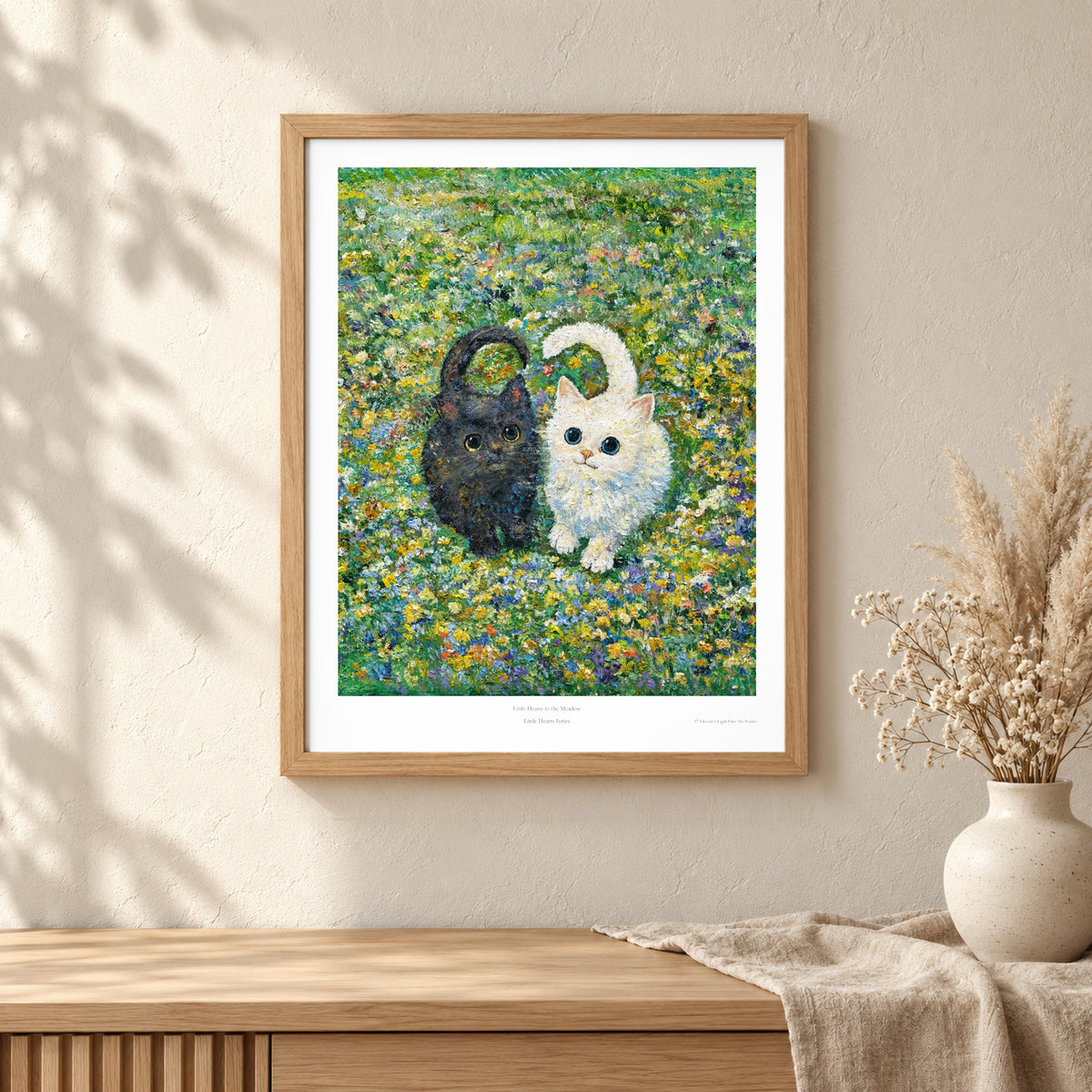 Little Hearts in the Meadow art print shown in an oak frame on a wall (frame not included)
