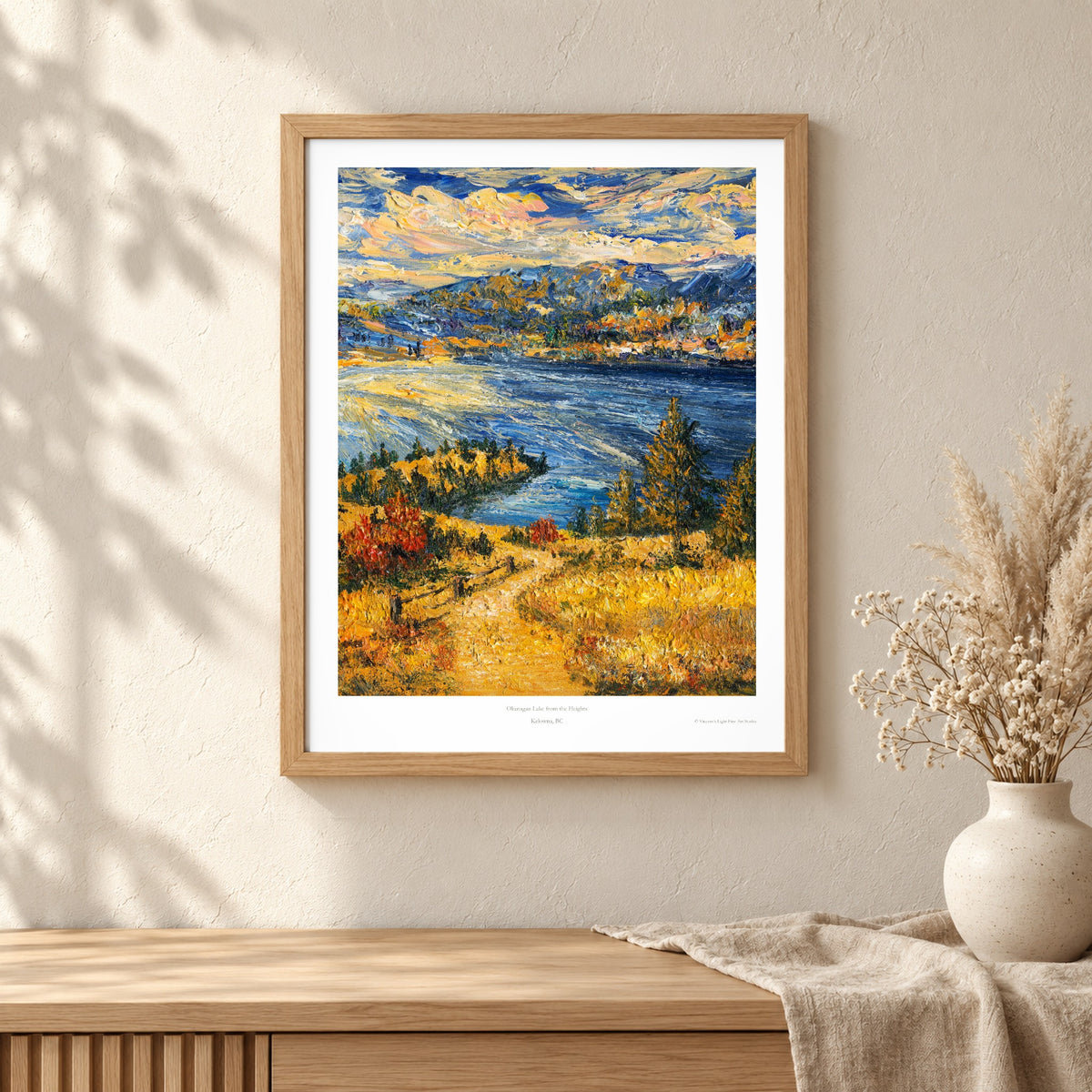 Okanagan Lake from the Heights art print shown in an oak frame on a wall (frame not included)