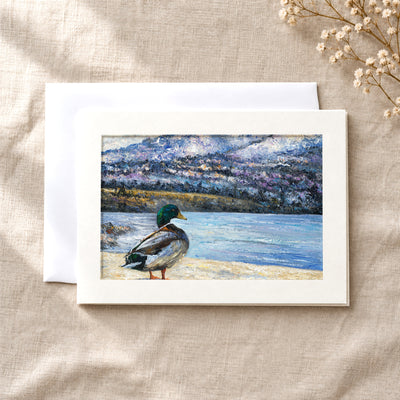 Okanagan Lake at the Edge of Winter art card: a folded 5×7 card with the artwork in a centred window, with a white envelope
