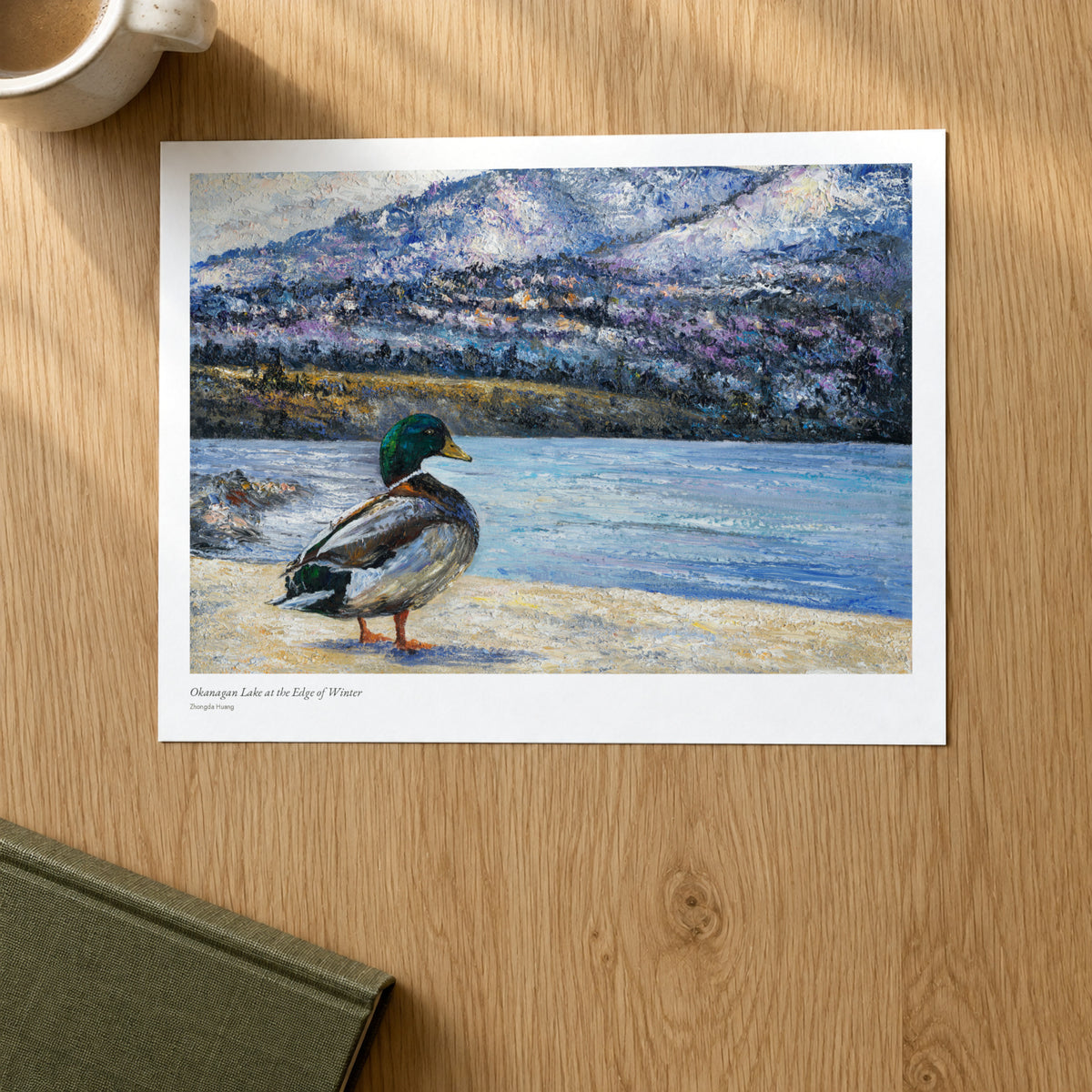 Okanagan Lake at the Edge of Winter studio print on a light oak desk