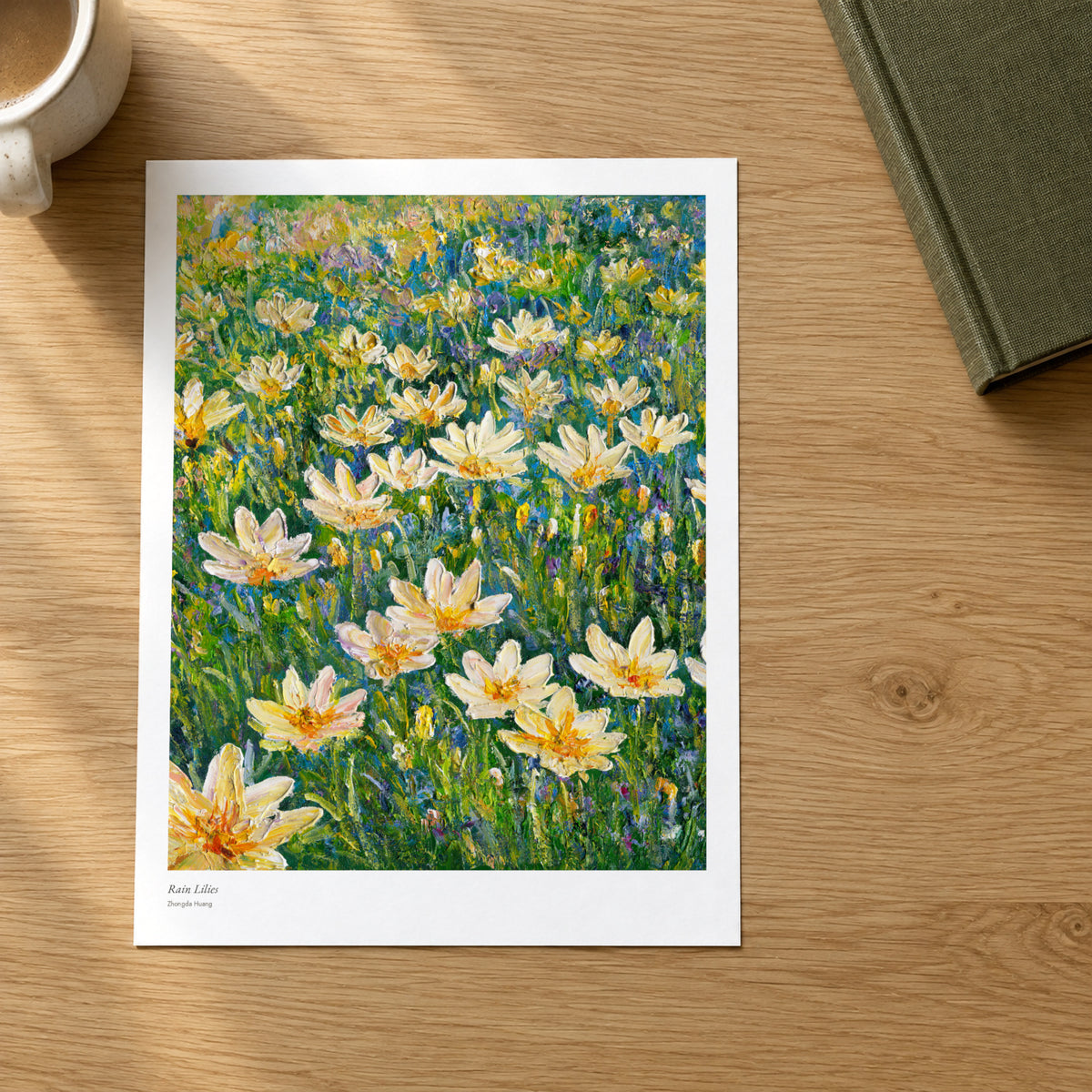 Rain Lilies studio print on a light oak desk