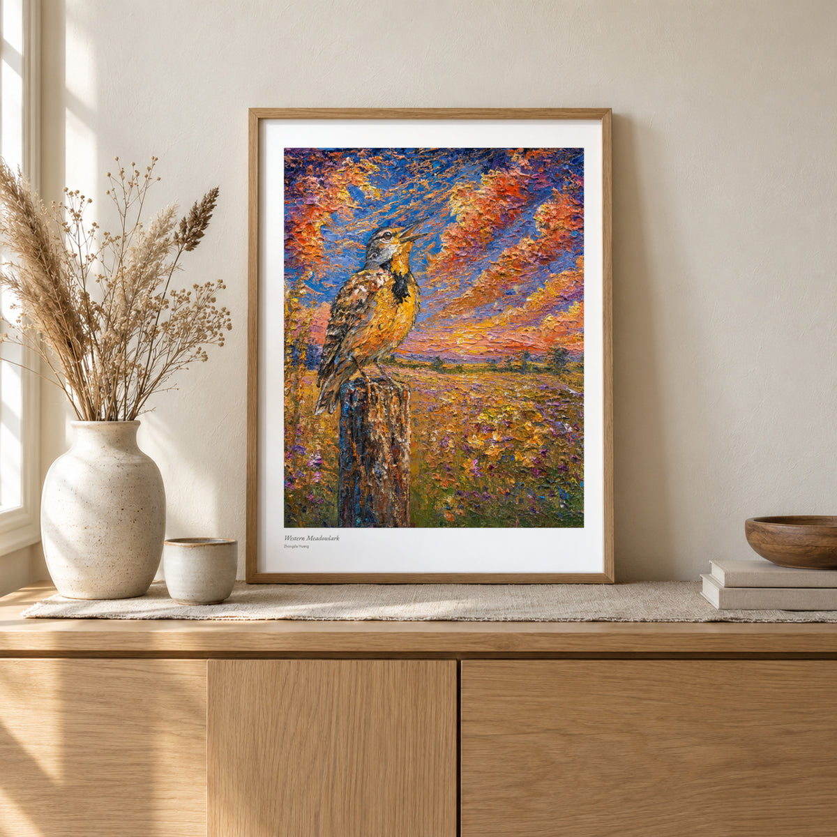 Western Meadowlark studio print, 17 × 22 in, in a light oak frame on a sideboard (frame not included)