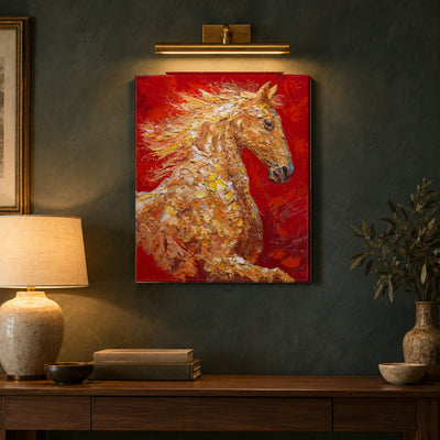 Blazing Spirit by Yingzhi Chen hanging on a deep teal-grey limewash wall above a walnut console with a ceramic lamp and a stack of books