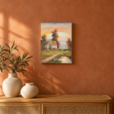 Cottage by the Water by Yingzhi Chen hanging on a terracotta clay limewash wall above a low rattan console with two cream ceramic vases