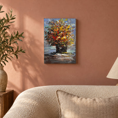 Ember Bouquet by Yingzhi Chen hanging on a dusty rose plaster wall above a cream bouclé sofa back with a linen cushion