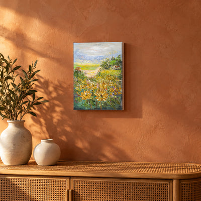 Golden Meadow by Yingzhi Chen hanging on a terracotta clay limewash wall above a low rattan console with two cream ceramic vases