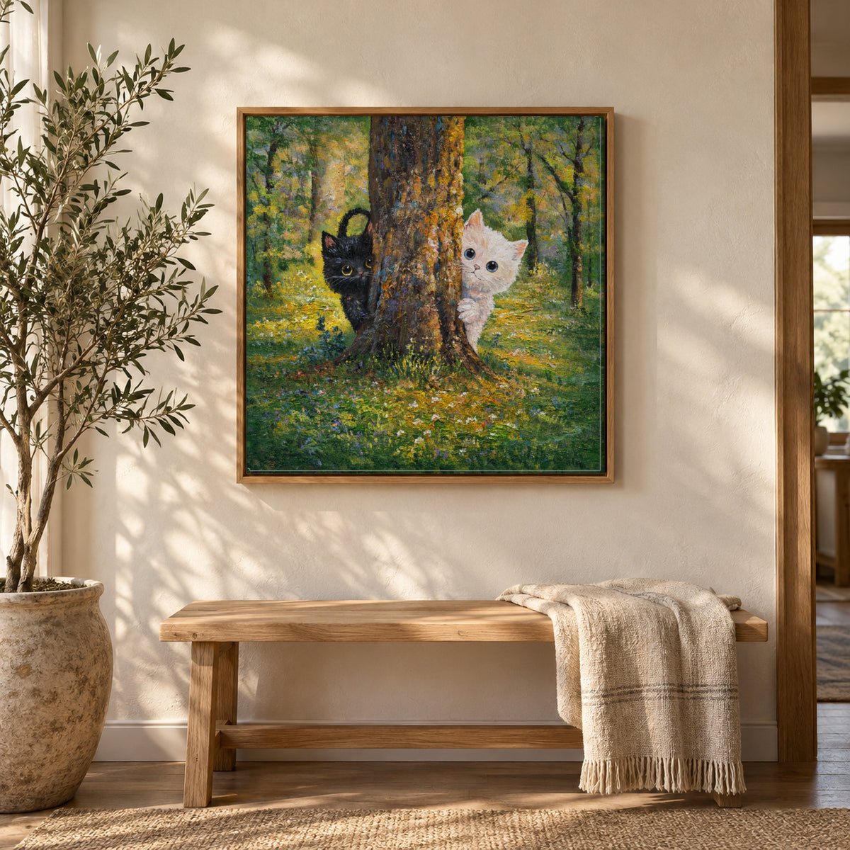 Hide and Seek by Zhongda Huang hanging on a warm off-white plaster wall above a light oak bench with a folded linen throw and a potted olive tree