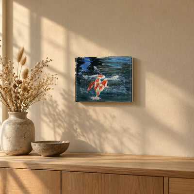 Koi in Motion by Yingzhi Chen hanging on a warm sand plaster wall above a light oak sideboard with a stoneware vase of dried grasses