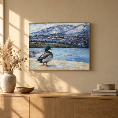 Okanagan Lake at the Edge of Winter by Zhongda Huang hanging on a warm sand plaster wall above a light oak sideboard with a stoneware vase of dried grasses